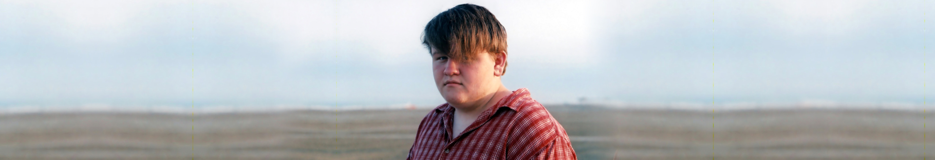 mentally challenge young man standing